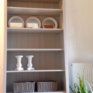 Bespoke fitted book shelves with elegant painted finish and classic design by Nest at Number 20