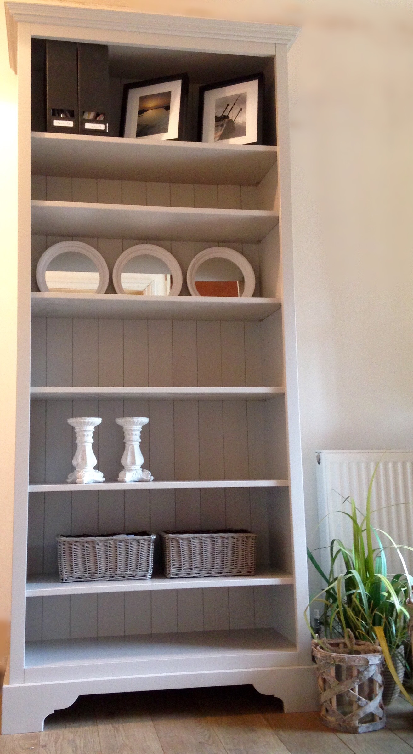 Bespoke fitted book shelves with elegant painted finish and classic design by Nest at Number 20